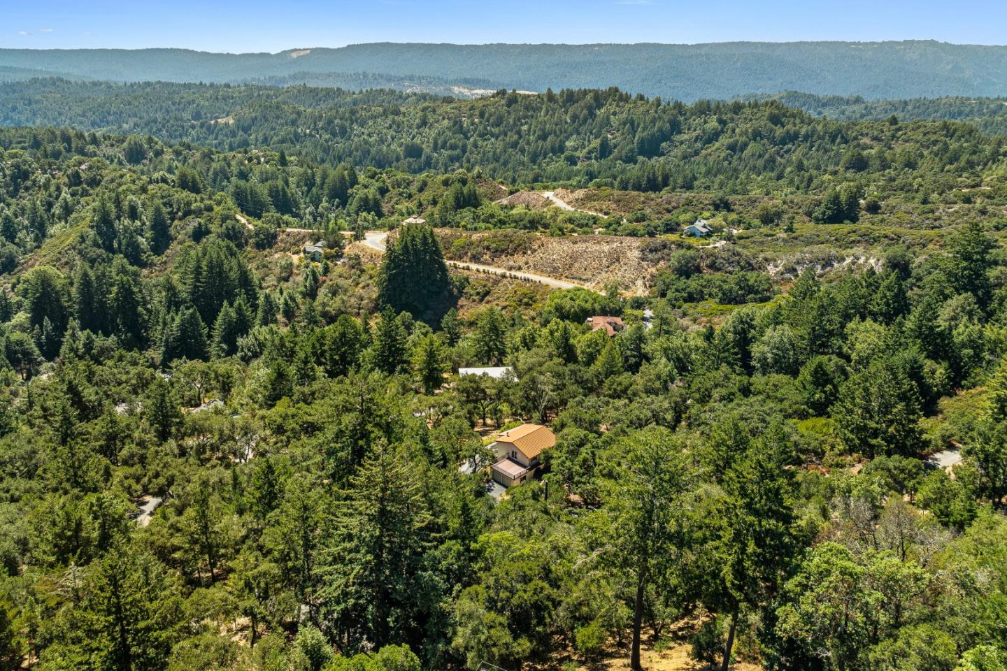 1375 Weston Ridge Road Scotts Valley, CA 95066 - Photo 57 of 68 a view of a forest with a street