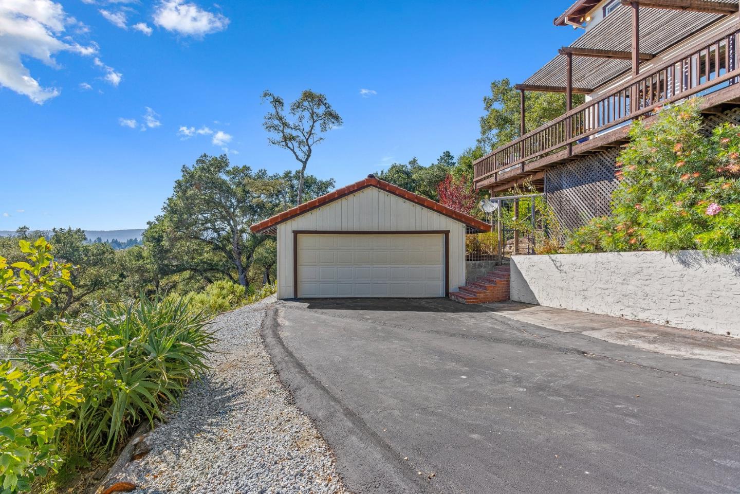 1375 Weston Ridge Road Scotts Valley, CA 95066 - Photo 63 of 68 a view of a house with a yard and potted plants