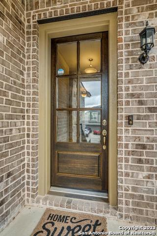 12515 Ponder Ranch San Antonio, TX 78245 - Photo 2 of 27 a view of a door and a window