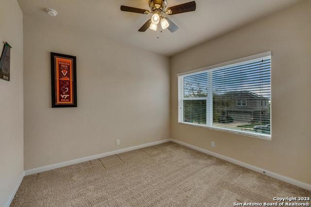 12515 Ponder Ranch San Antonio, TX 78245 - Photo 22 of 27 a view of an empty room with a window