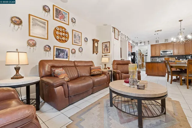 a living room with furniture and a table