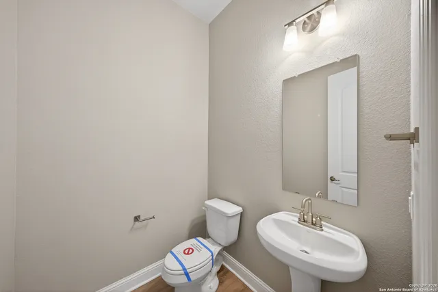a bathroom with a sink and a toilet