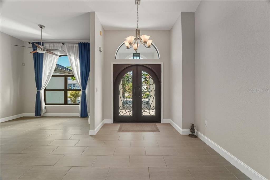7314 Powder Puff Punta Gorda, FL 33955 - Photo 15 of 48 a view of an entryway door with wooden floor