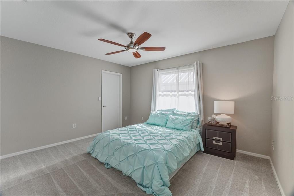 7314 Powder Puff Punta Gorda, FL 33955 - Photo 27 of 48 a bedroom with a bed and a window