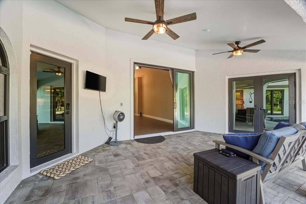 7314 Powder Puff Punta Gorda, FL 33955 - Photo 43 of 48 a living room with furniture a window and a flat screen tv