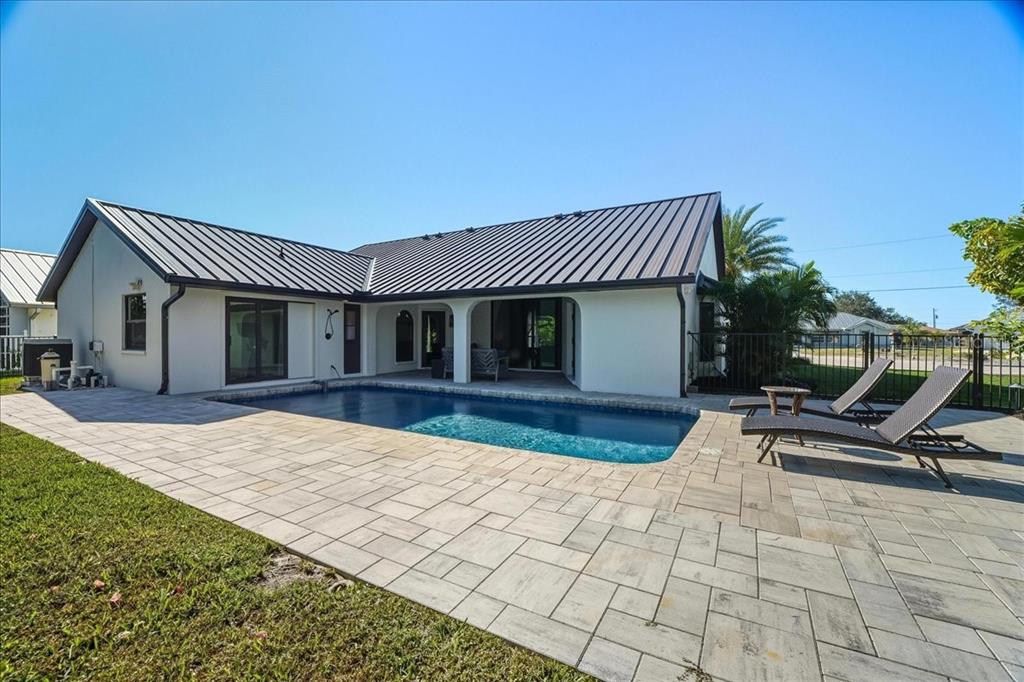 7314 Powder Puff Punta Gorda, FL 33955 - Photo 44 of 48 a view of house with backyard and outdoor seating