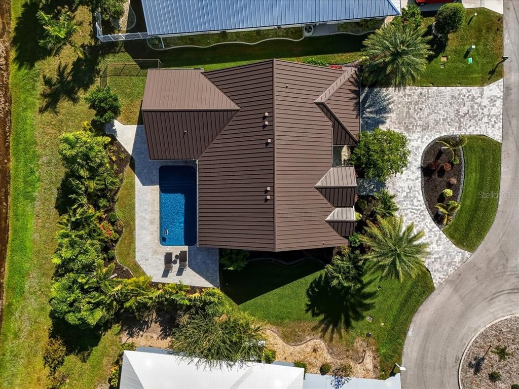 7314 Powder Puff Punta Gorda, FL 33955 - Photo 47 of 48 a aerial view of a house with a yard and potted plants