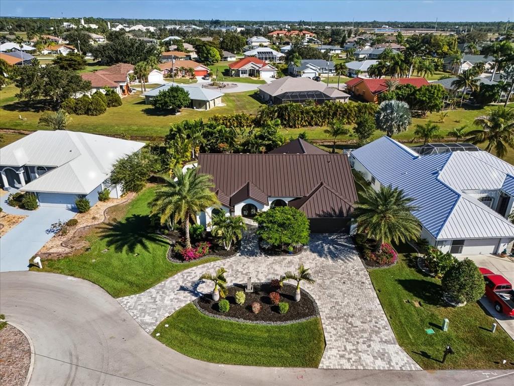 7314 Powder Puff Punta Gorda, FL 33955 - Photo 8 of 48 an aerial view of a house with garden space and lake view