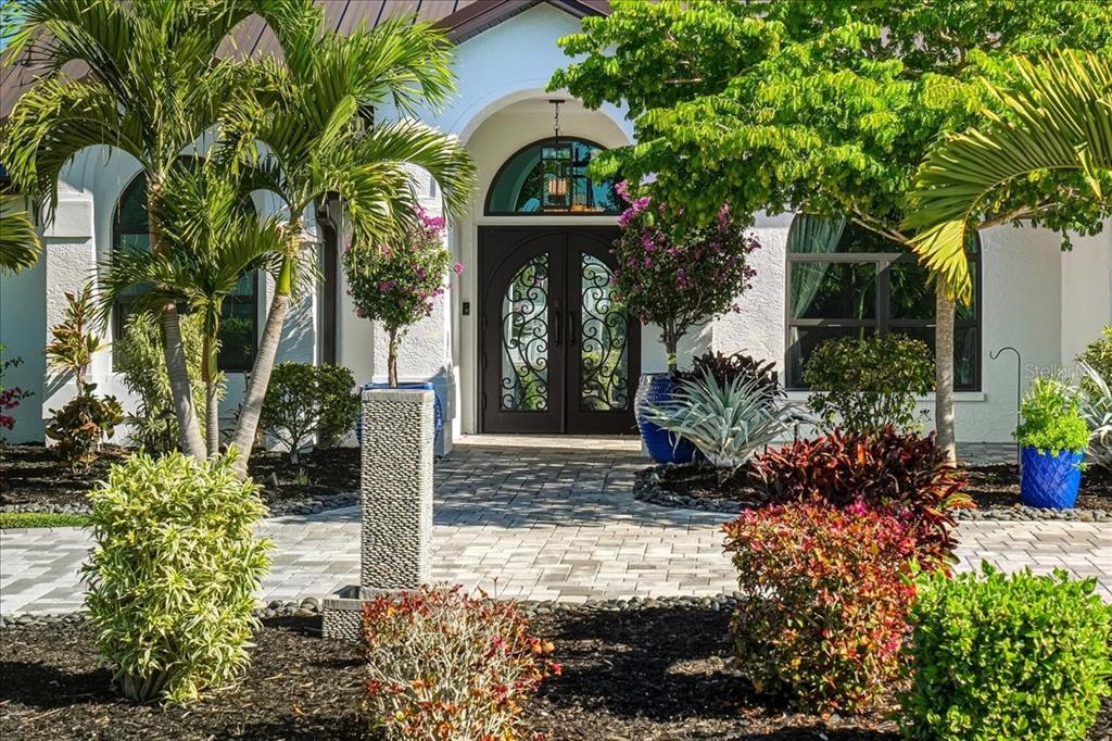 7314 Powder Puff Punta Gorda, FL 33955 - Photo 10 of 48 a front view of a house with garden