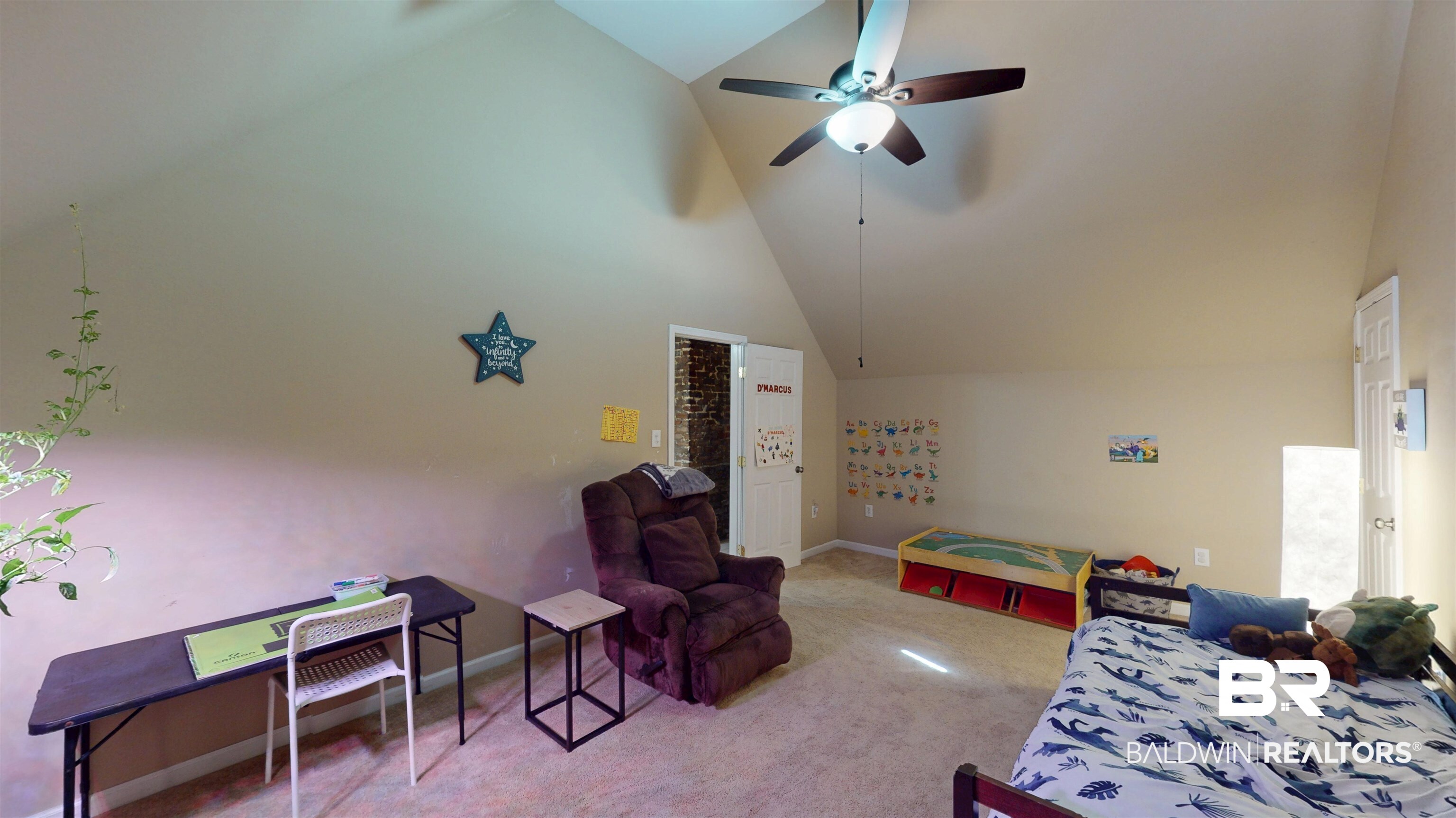 1154 New St Francis Street Mobile, AL 36604 - Photo 30 of 37 Carpeted bedroom with high vaulted ceiling, baseboards, and a ceiling fan