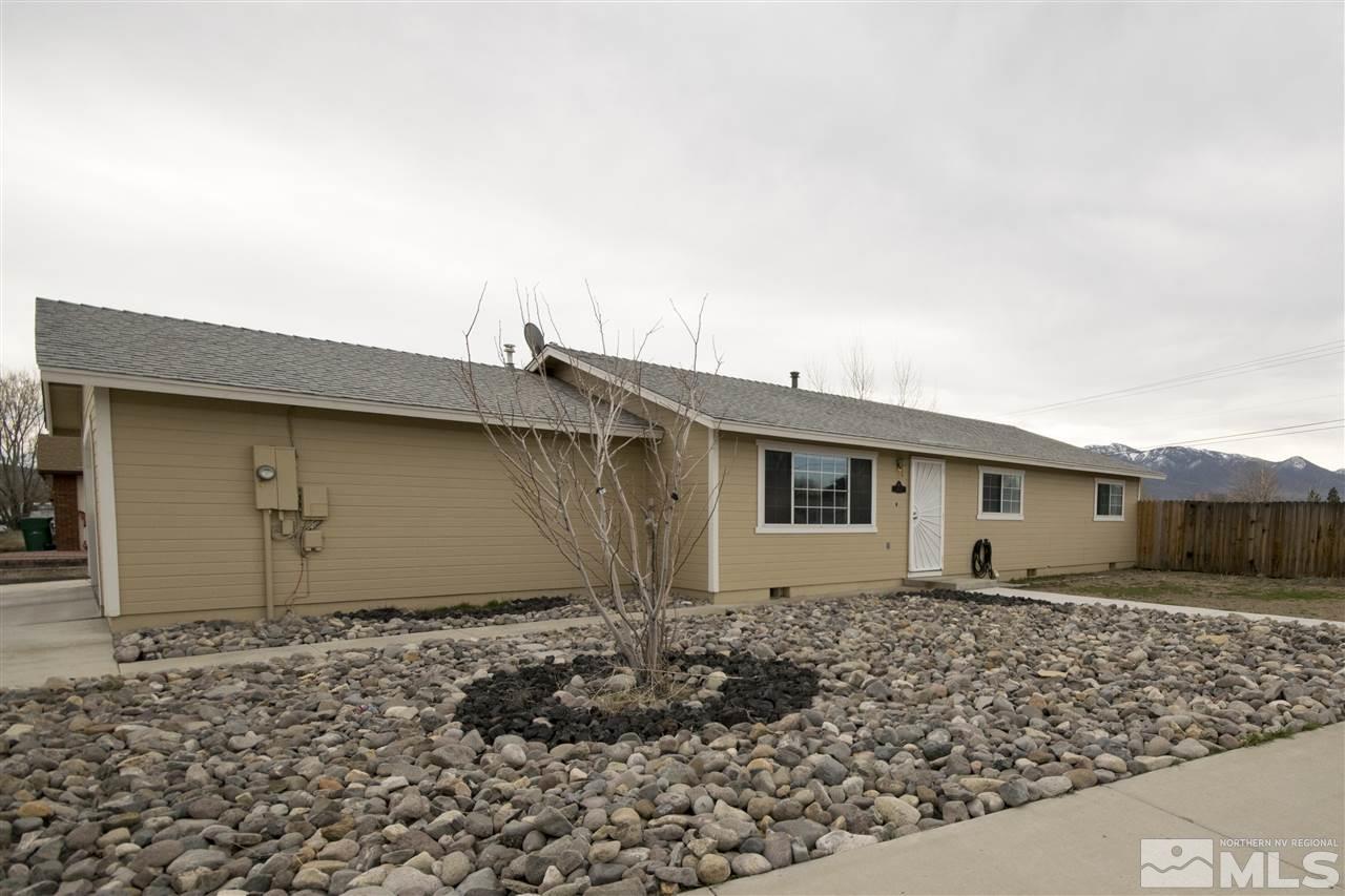 401 River Boat Road Dayton, NV 89403 - Photo 1 of 1 a backyard of a house with large trees