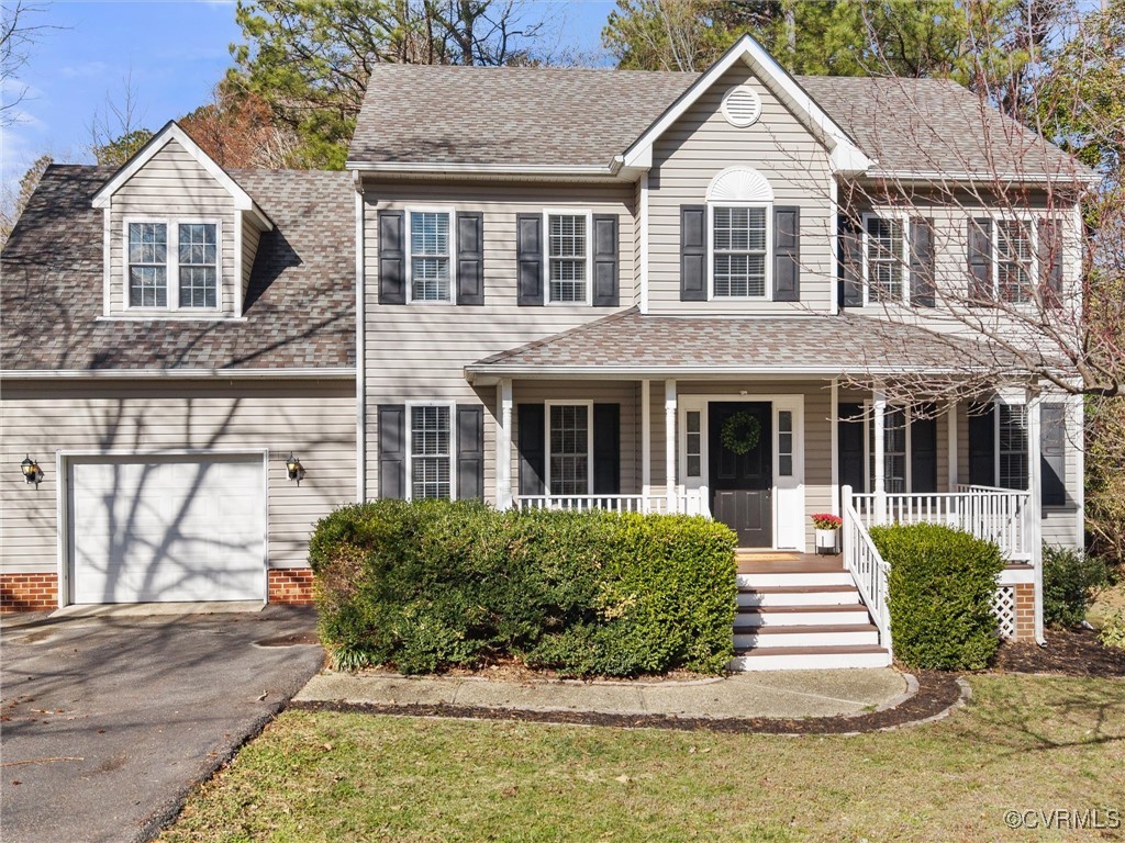 3640 Markey Road Midlothian, VA 23112 - Photo 1 of 42 a front view of a house with a yard