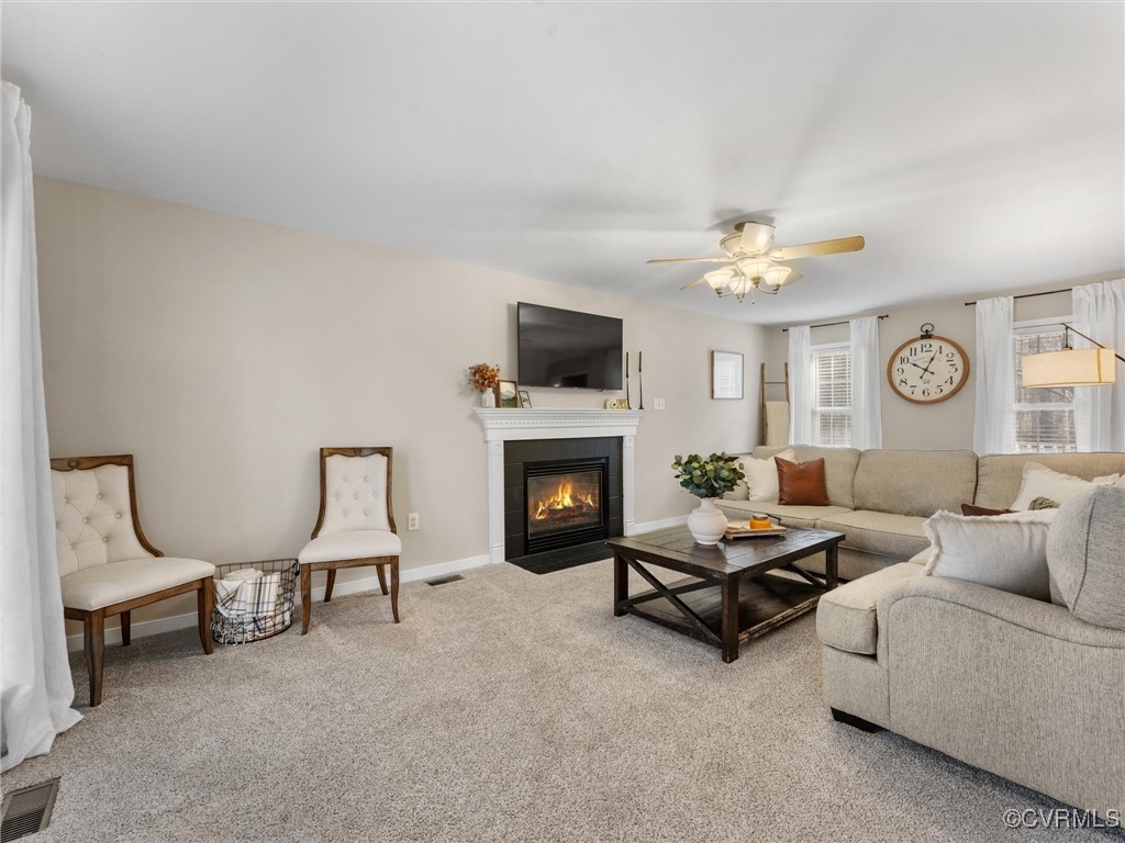 3640 Markey Road Midlothian, VA 23112 - Photo 24 of 42 a living room with furniture and a fireplace