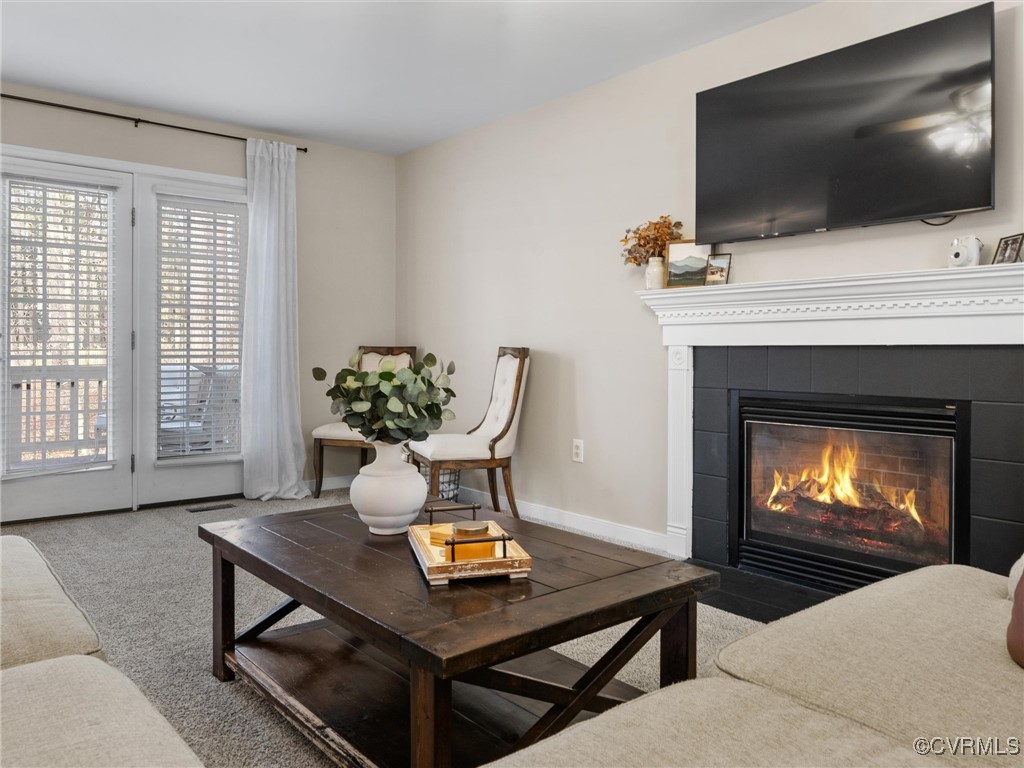 3640 Markey Road Midlothian, VA 23112 - Photo 27 of 42 a living room with furniture and a flat screen tv