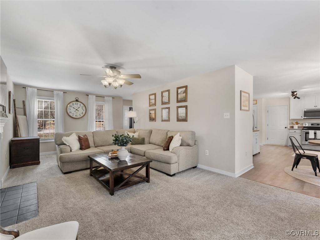 3640 Markey Road Midlothian, VA 23112 - Photo 28 of 42 a living room with furniture and a large window