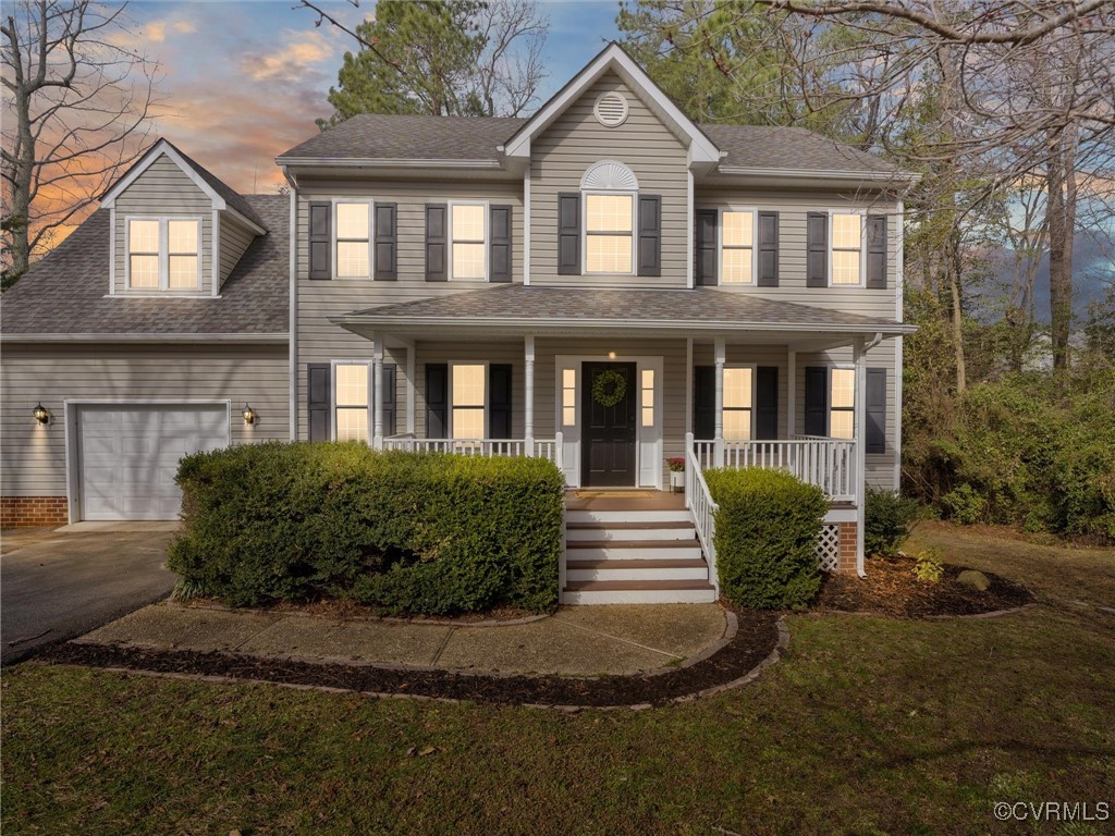 3640 Markey Road Midlothian, VA 23112 - Photo 3 of 42 a front view of a house with a yard