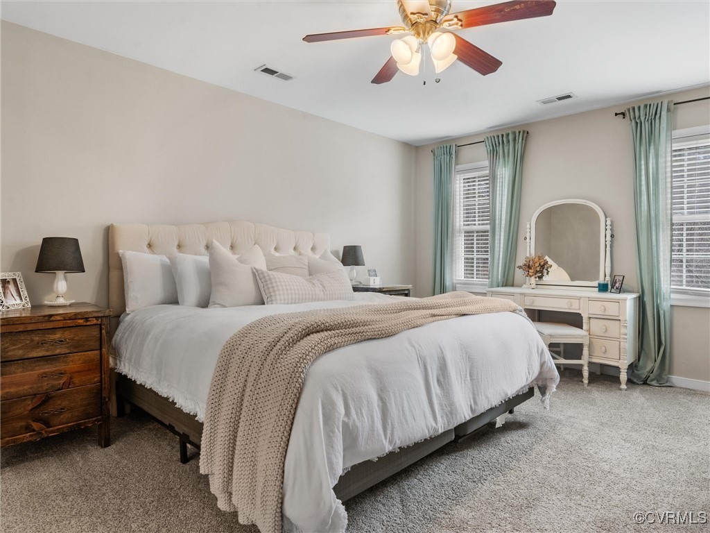 3640 Markey Road Midlothian, VA 23112 - Photo 32 of 42 a bedroom with bed and a chandelier