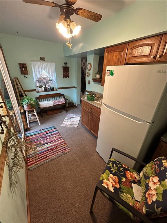 629 South Summit Street Derry, PA 15627 - Photo 13 of 30 a bedroom with furniture and a chandelier