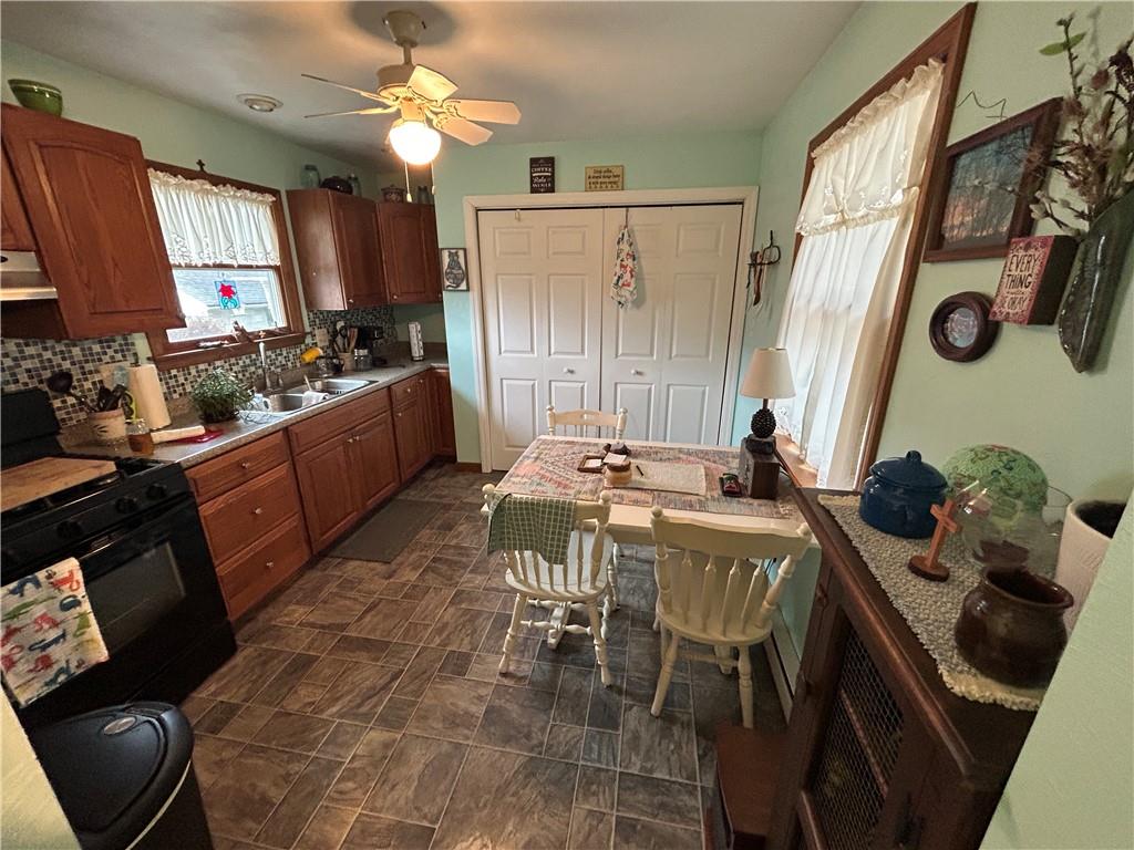 629 South Summit Street Derry, PA 15627 - Photo 14 of 30 a view of a dining room with furniture and chandelier