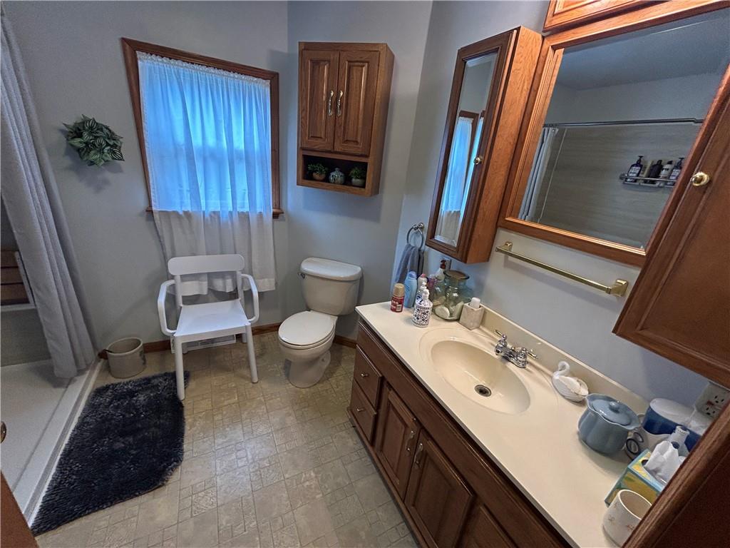 629 South Summit Street Derry, PA 15627 - Photo 16 of 30 a bathroom with a sink and a mirror