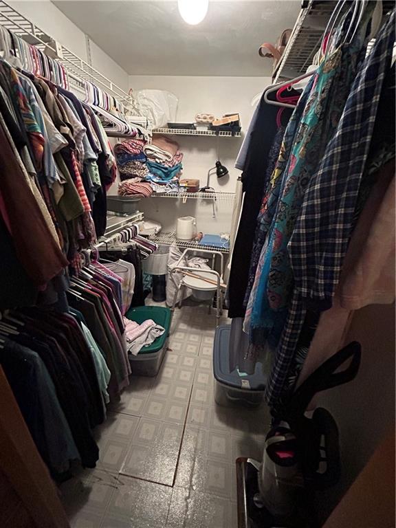 629 South Summit Street Derry, PA 15627 - Photo 20 of 30 a view of walk in closet with clothes and shoes