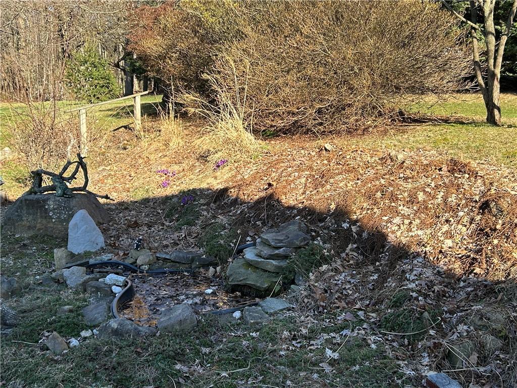 629 South Summit Street Derry, PA 15627 - Photo 5 of 30 a view of a yard with wooden fence