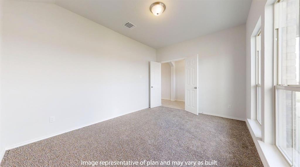 5800 Foggy Lagoon Drive Waco, TX 76708 - Photo 21 of 24 a view of an empty room and a window