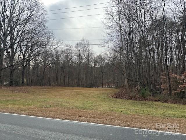 1651 Mollys Backbone Road Sherrills Ford, NC 28673 - Photo 2 of 2 a view of a yard with a wooden fence