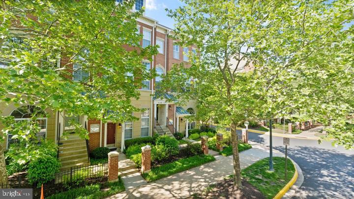 1918 Crescent Park Drive Reston, VA 20190 - Photo 31 of 33 Charming townhomes amidst lush greenery.