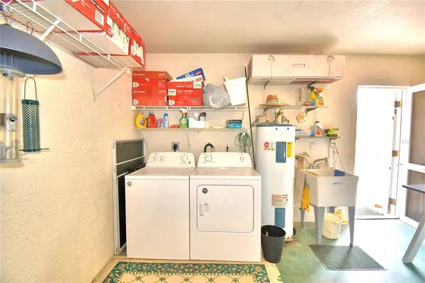 a utility room with dryer and washer
