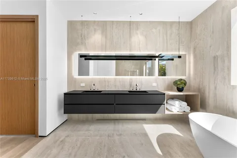 a bed room with a bed and a window