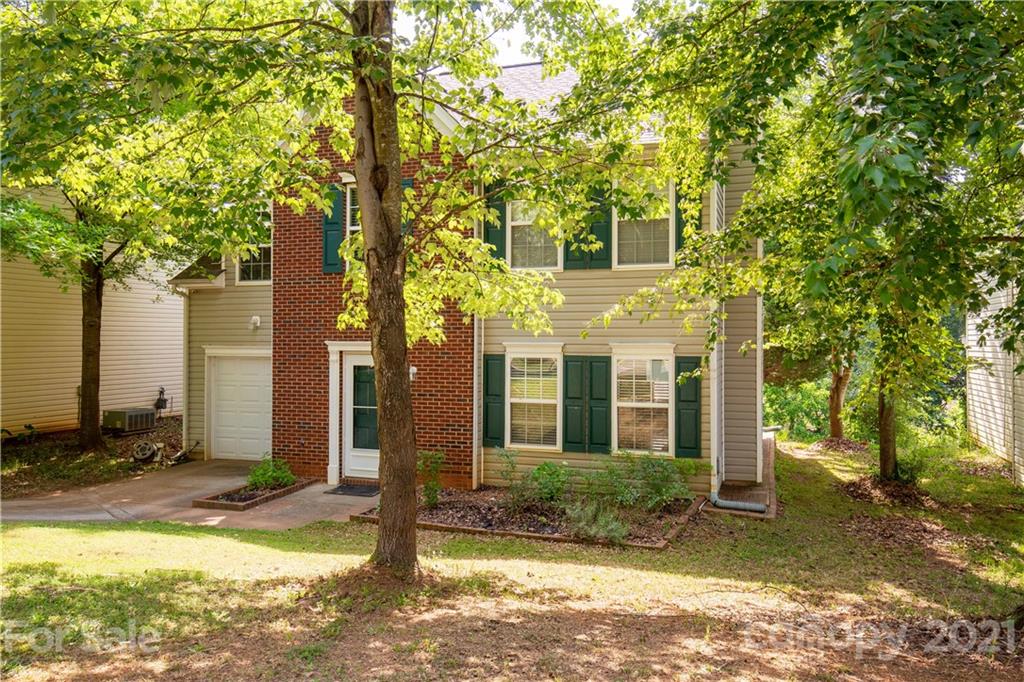 1268 Winding Path Road Clover, SC 29710 - Photo 2 of 19 front view of a house with a yard