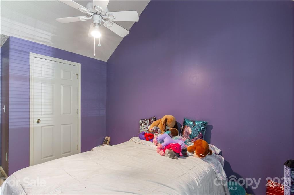 1268 Winding Path Road Clover, SC 29710 - Photo 14 of 19 a bedroom with a bed and hallway