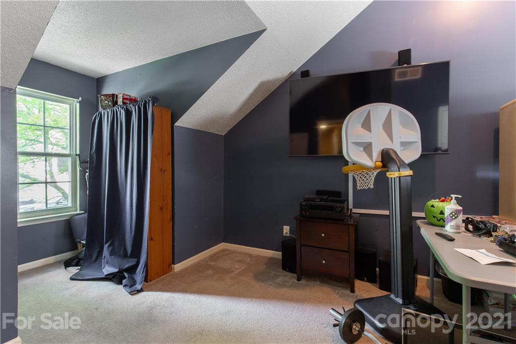 1268 Winding Path Road Clover, SC 29710 - Photo 16 of 19 a room with furniture and a window
