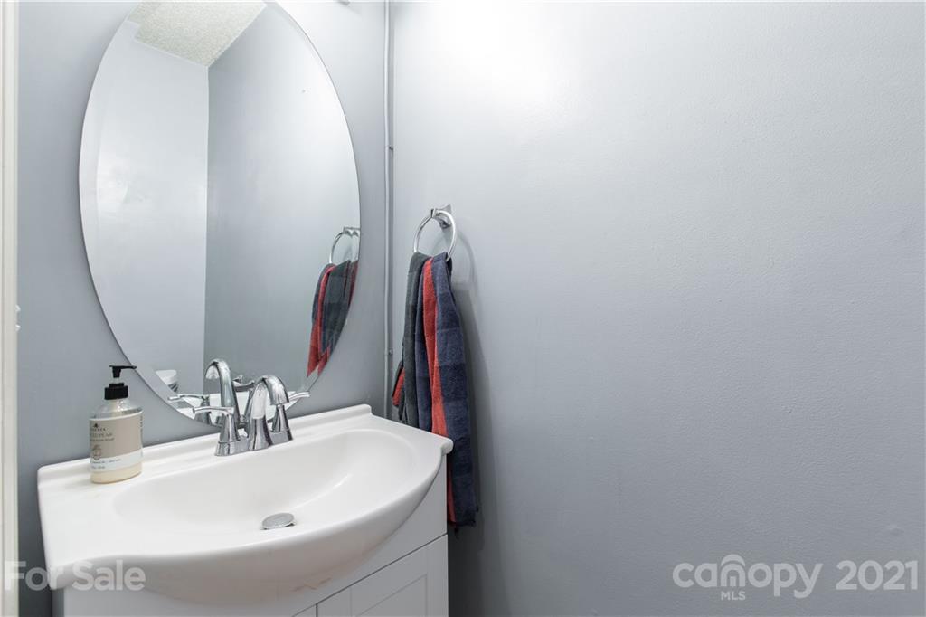 1268 Winding Path Road Clover, SC 29710 - Photo 9 of 19 a bathroom with a sink and a mirror
