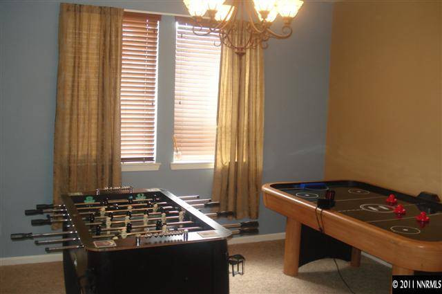 14040 Tagor Road Reno, NV 89521 - Photo 10 of 13 a room with furniture and window