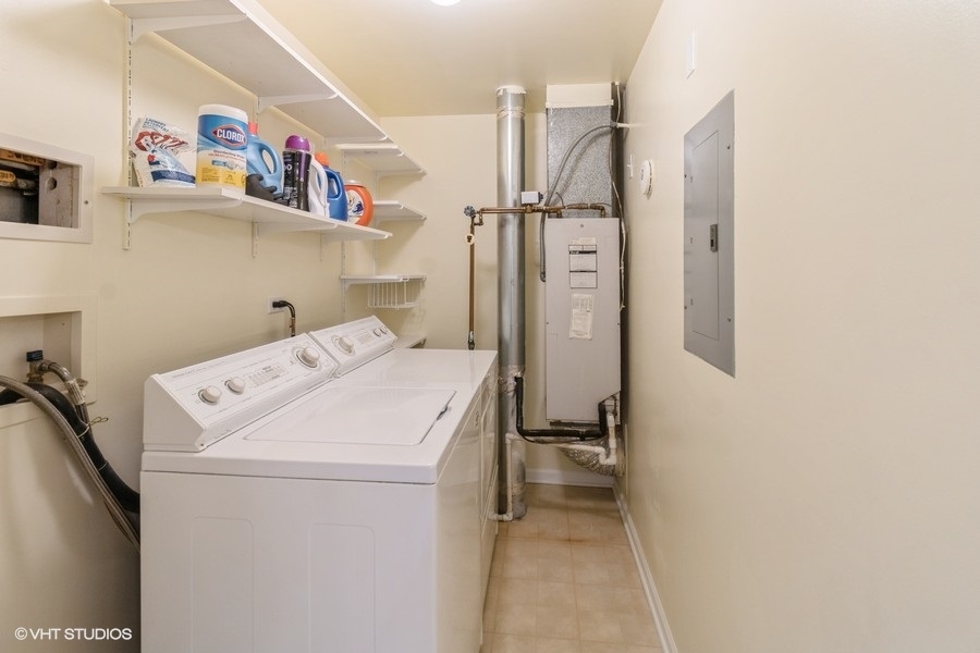 3135 Town Square Drive, Unit 106 Rolling Meadows, IL 60008 - Photo 16 of 20 a utility room with dryer and washer