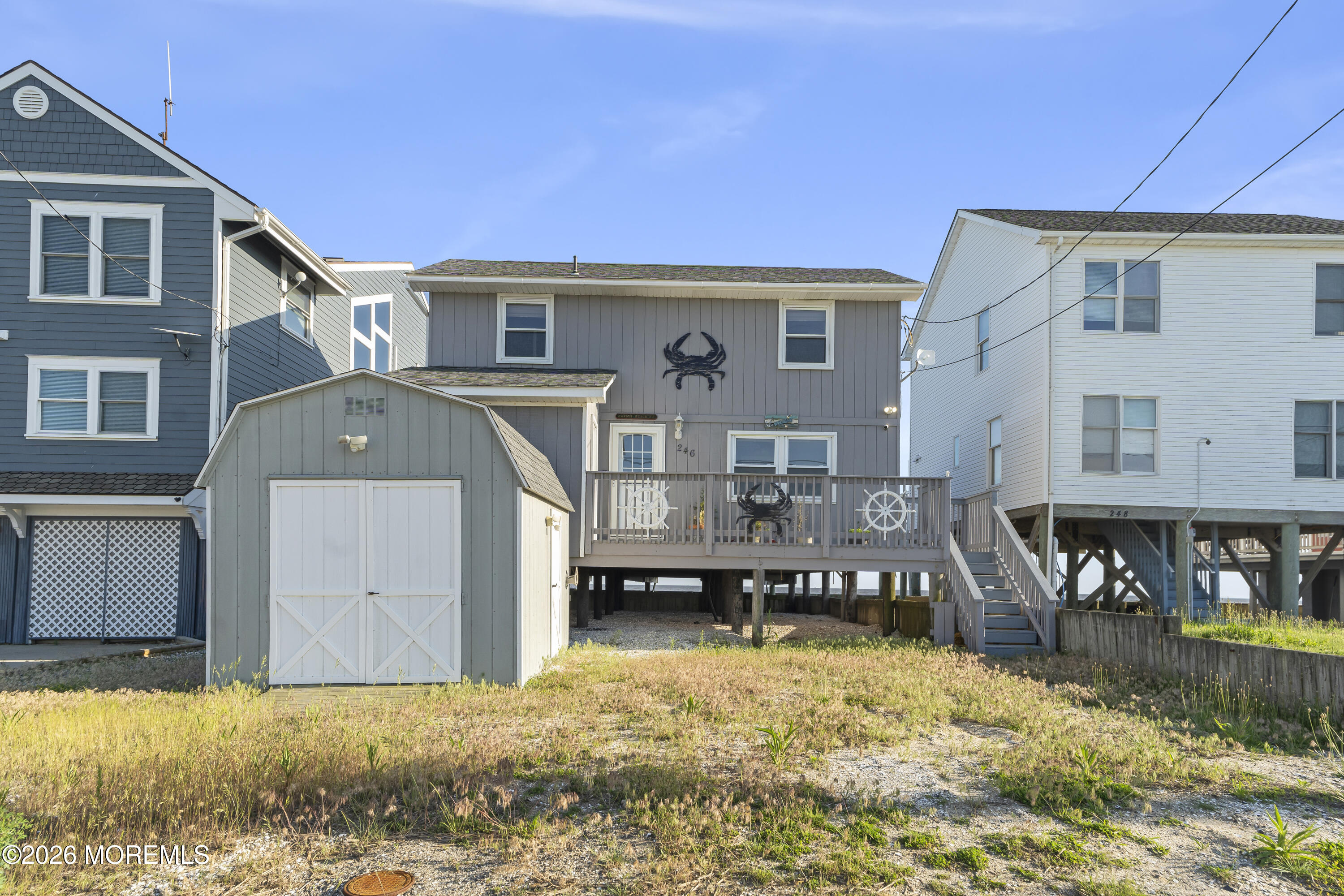 246 Cove Road Newport, NJ 08345 - Photo 3 of 21 a front view of a house with a yard