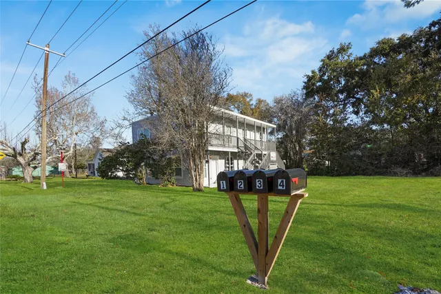 a view of a park with welcome board