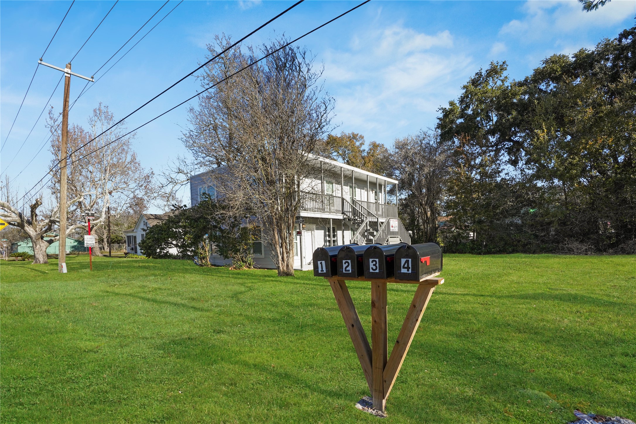 819 Oak Street La Marque, TX 77568 - Photo 2 of 9 a view of a park with welcome board