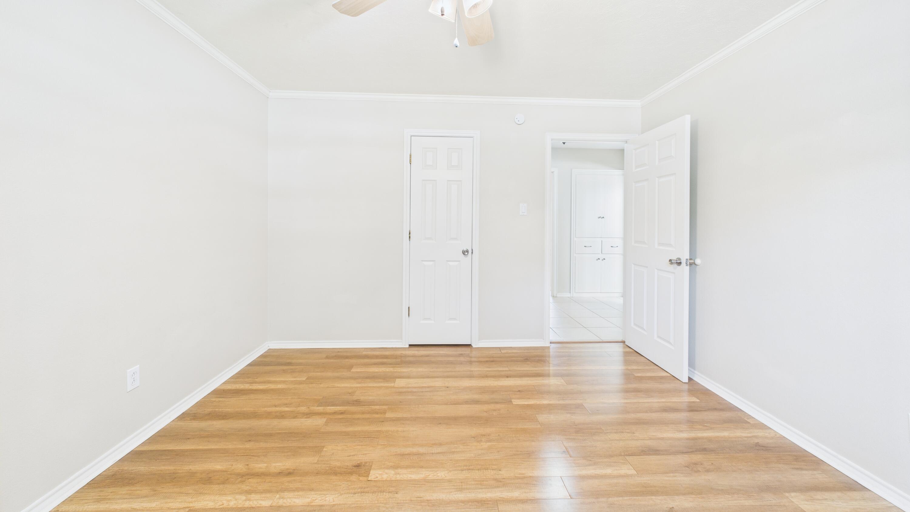 3022 67th Street Lubbock, TX 79413 - Photo 32 of 42 a view of a room with wooden floor