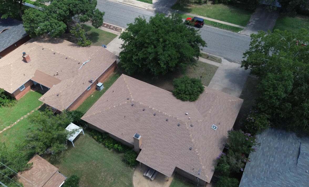 3022 67th Street Lubbock, TX 79413 - Photo 39 of 42 an aerial view of a house with outdoor space
