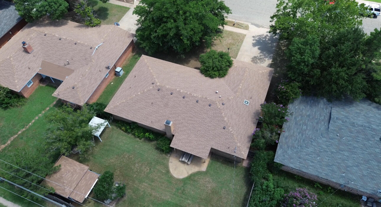 3022 67th Street Lubbock, TX 79413 - Photo 40 of 42 an aerial view of a house