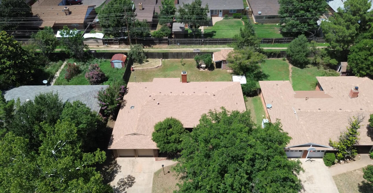 3022 67th Street Lubbock, TX 79413 - Photo 41 of 42 an aerial view of a house with outdoor space