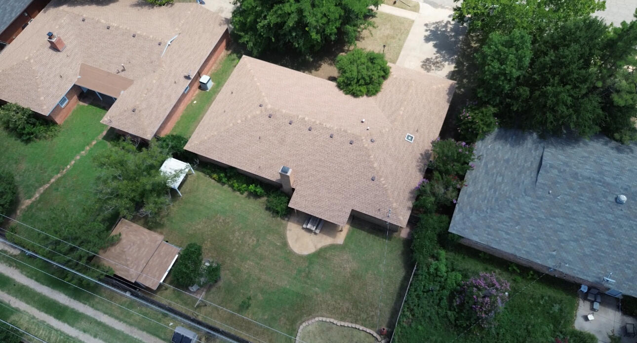 3022 67th Street Lubbock, TX 79413 - Photo 42 of 42 an aerial view of a house