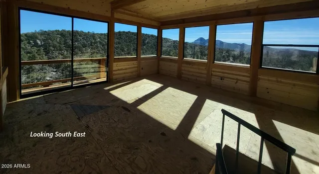 a view of a floor to ceiling window in an empty room