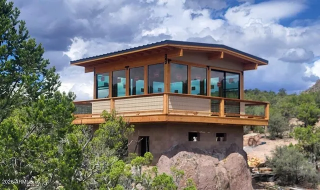 a front view of a house with balcony