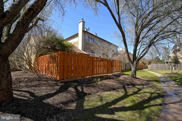a view of a backyard of the house