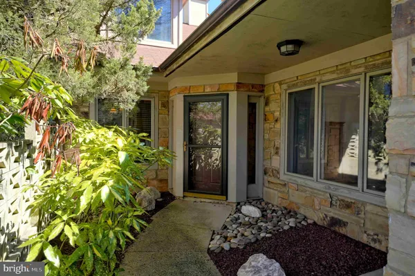 a view of a entryway door front of house