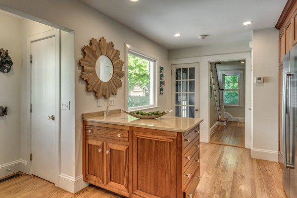 832 Webster Street Needham, MA 02492 - Photo 14 of 28 an entryway with wooden floor and door
